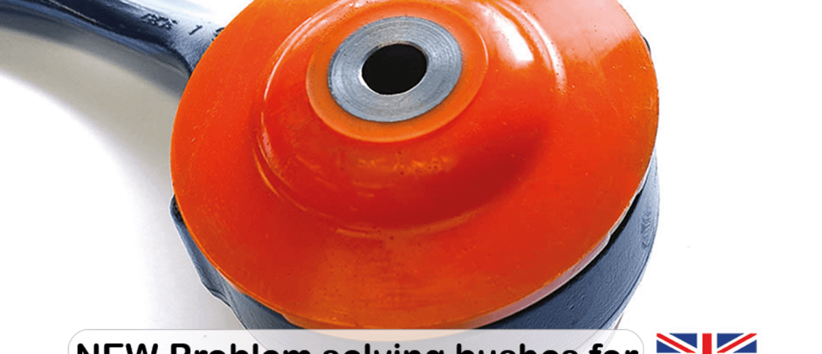 Close-up of a new orange bushing for Land Rover L405, L494 & L462 models, displayed with a blue metal component. The image includes a "made in Britain" label, company contact details, and logo.
