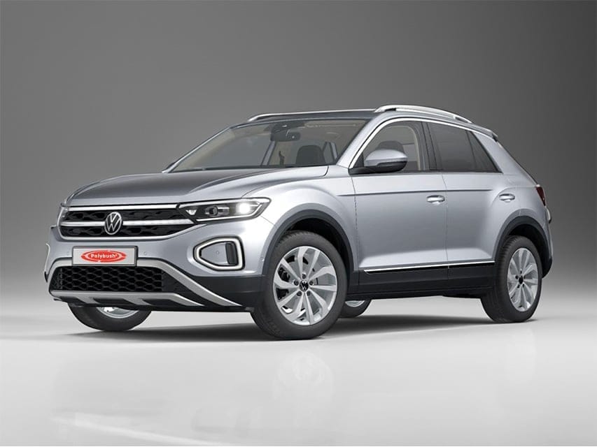 A silver Volkswagen T-Cross SUV parked in a studio, with a clean grey background and soft lighting that highlights its modern design and sleek lines.