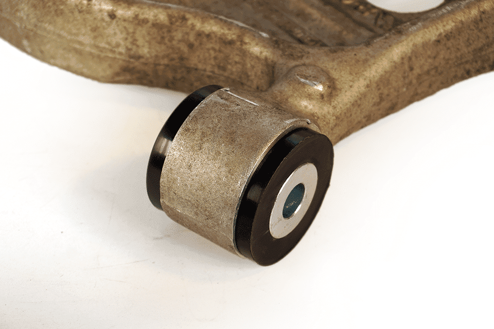 Close-up of a metallic socket spanner with a swivel head attached, positioned on a plain white background. The tool shows signs of use with slight wear.