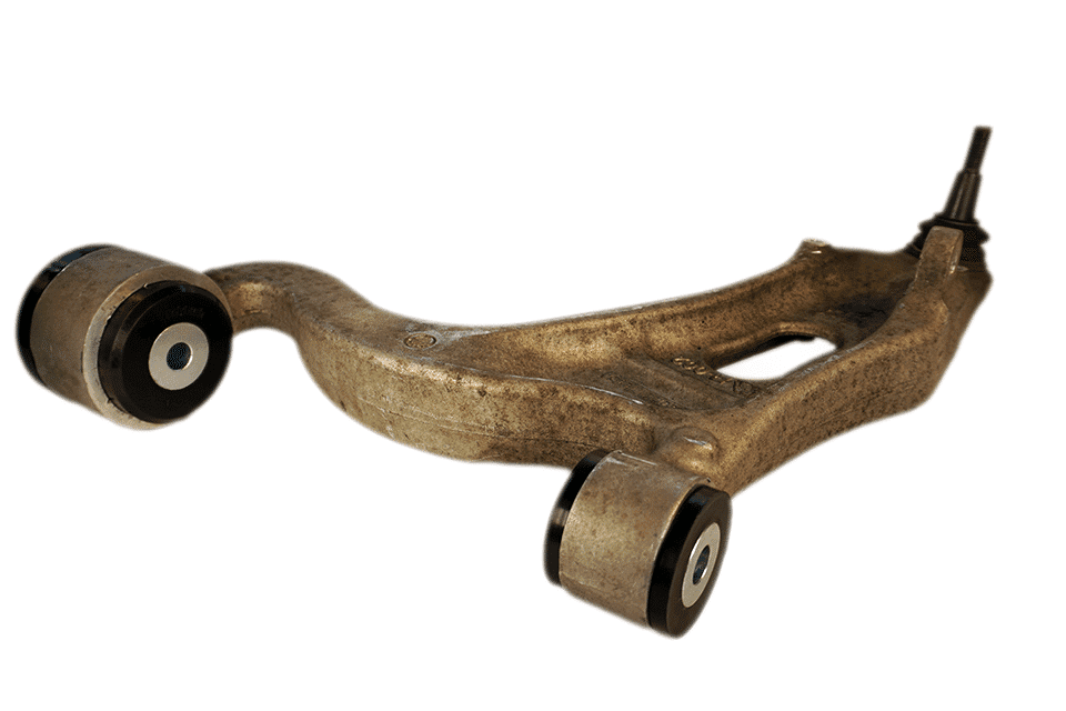 A control arm from a vehicle with two rubber bushings, made of metallic material, displayed on a plain white backdrop.