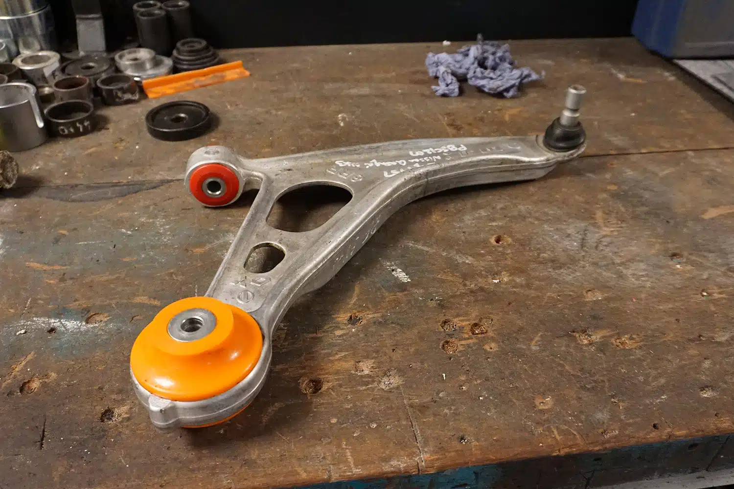 12AT 12AU - Bushes Fitted To Arm - Nissan Qashqai - Different grades of polyurethane